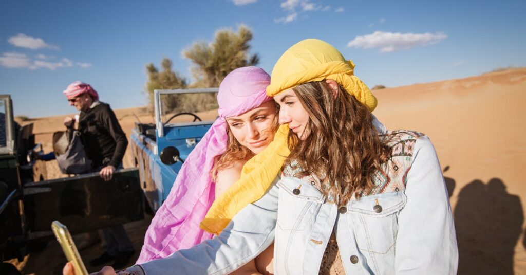 Two Women Wearing Head Scarf Taking Selfie Together